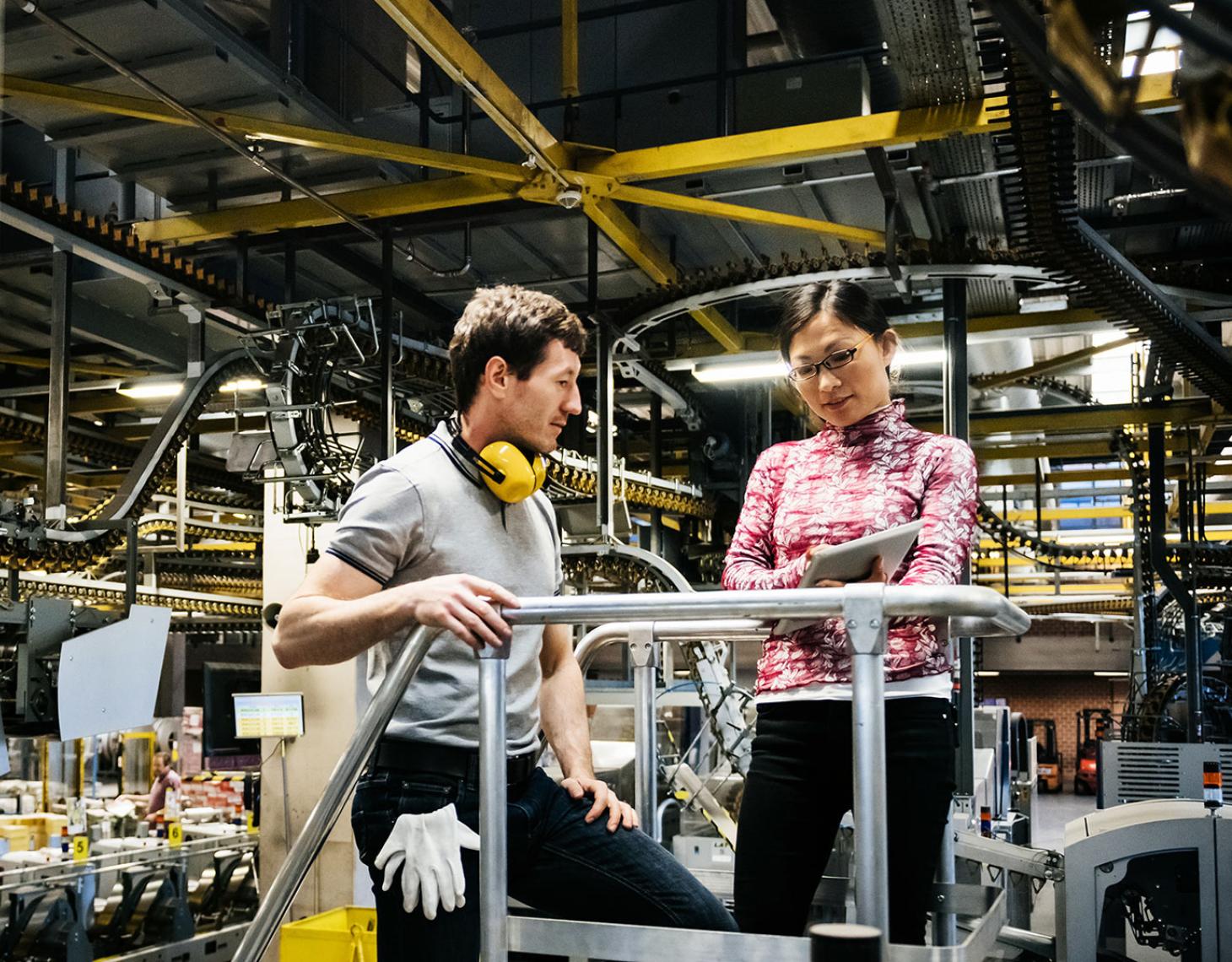 Two manufacturing employees