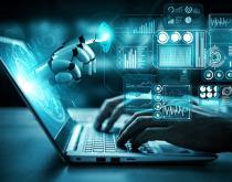 Human and robotic hands work together with finance automation