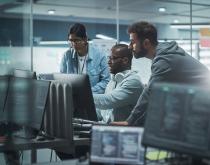 Multiracial cybersecurity team at work