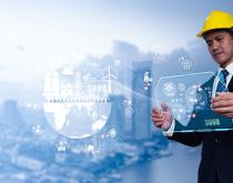 Man looking at energy dashboard for manufacturing plant