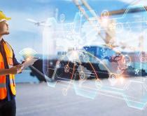 Man using technology to manage industrial facility