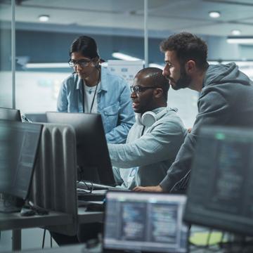 Multiracial cybersecurity team at work