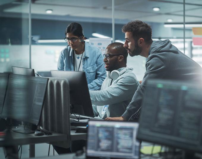 Multiracial cybersecurity team at work