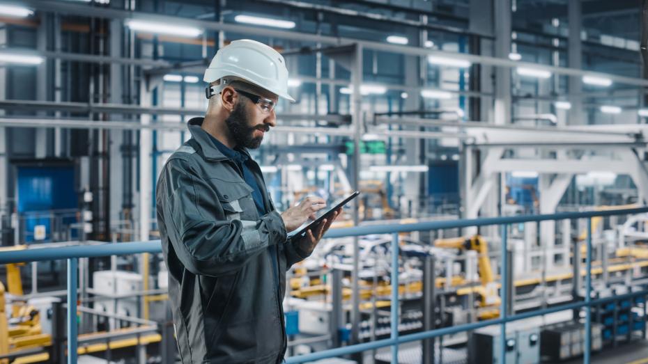 Manufacturing worker with iPad